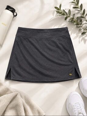 Nola Gray Performance Skort with Yellow Logo Tag